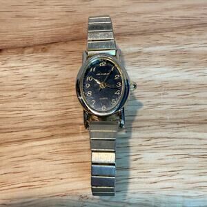 Mirage Quartz Stainless Steel Watch Silver Tone Stretch Band Wristwatch